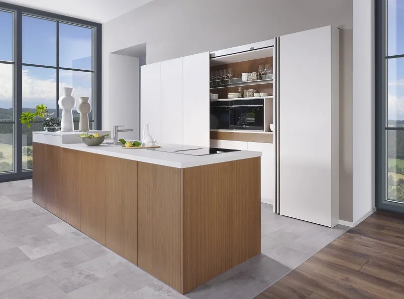 Cuisine aux lignes épurées avec son îlot central bois